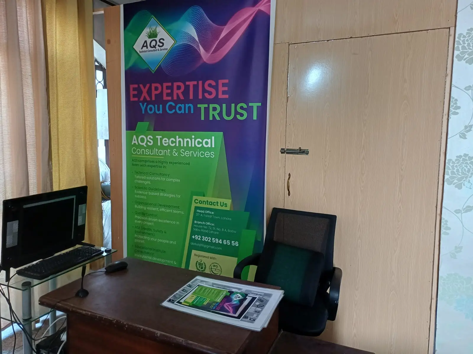 AQS consultants reviewing technical documentation